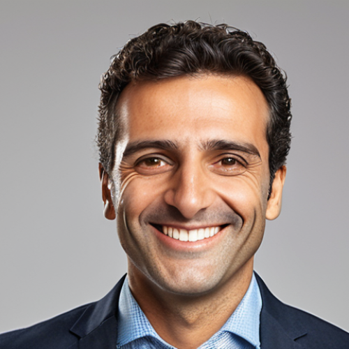 Home 14 **Professional LinkedIn Profile Picture:** A confident Italian professional smiling warmly. Well-lit studio setting. Wearing smart casual attire. Clean, modern background. Emphasis on approachability and competence.