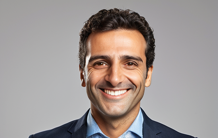 **Professional LinkedIn Profile Picture:** A confident Italian professional smiling warmly.  Well-lit studio setting.  Wearing smart casual attire.  Clean, modern background.  Emphasis on approachability and competence.